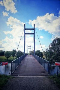 View of bridge against cloudy sky