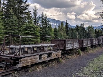 Train on railroad track against sky
