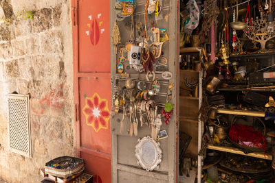 Various toys on wall of old building