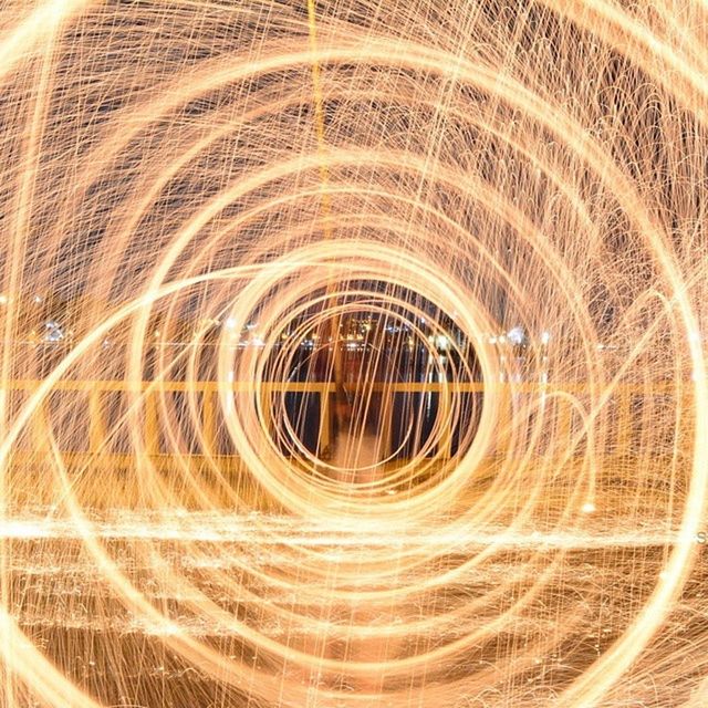 long exposure, motion, illuminated, circle, light trail, night, spinning, blurred motion, abstract, glowing, pattern, light painting, speed, arts culture and entertainment, orange color, backgrounds, wire wool, full frame, no people, yellow