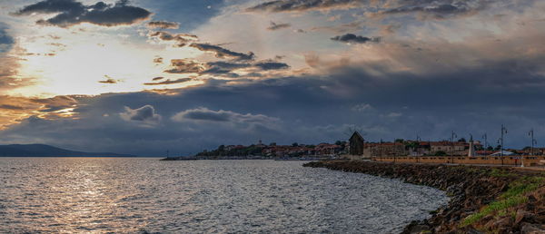 Scenic view of sea against sky during sunset