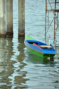 Boat moored in water