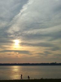 Scenic view of sea at sunset