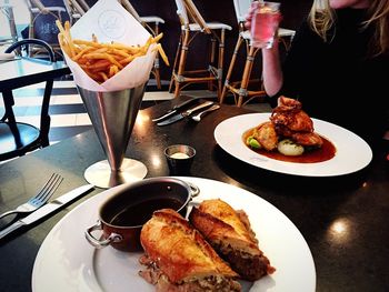 Close-up of served food on table
