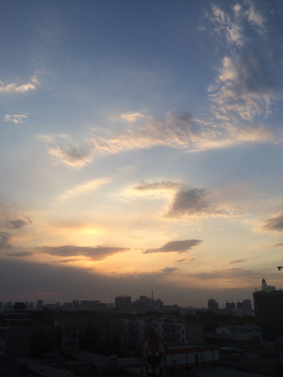 sunset, sky, cloud - sky, silhouette, building exterior, architecture, built structure, cloudy, scenics, cloud, beauty in nature, tranquility, tranquil scene, city, nature, weather, dusk, outdoors, moody sky, cloudscape