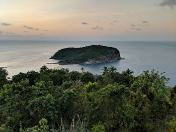 Scenic view of sea against sky at sunset