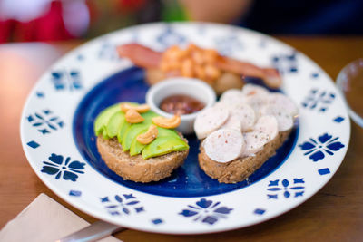 High angle view of breakfast in plate on table