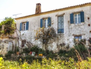 Low angle view of old building against sky