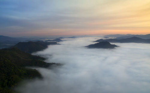 Scenic view of mountains against sky during sunset