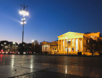 Illuminated buildings in city at night