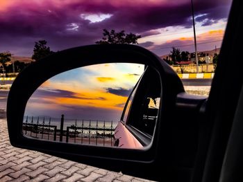 Reflection of sky on side-view mirror