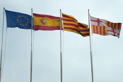 Low angle view of flags flag