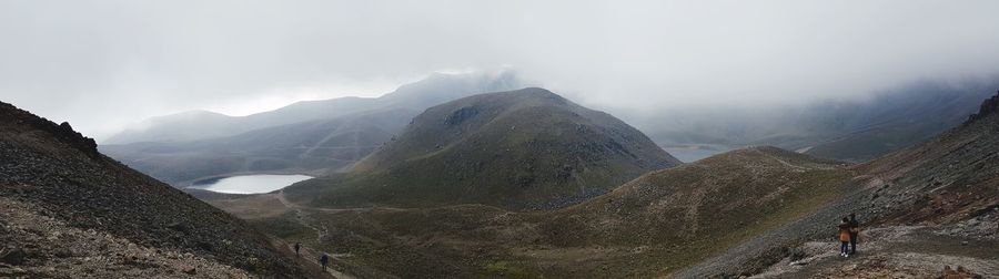 Panoramic view of mountains against sky