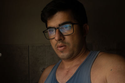 Portrait of young man wearing eyeglasses