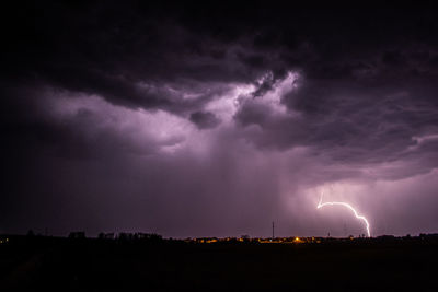 Scenic view of lightning against sky at night