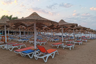 Scenic view of beach against sky during sunset