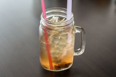 High angle view of drink in glass jar on wooden table