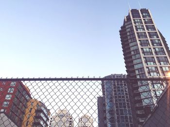 Low angle view of buildings against clear sky