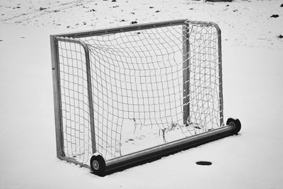 Close-up of soccer goal in snow