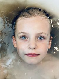 Portrait of boy in bathroom