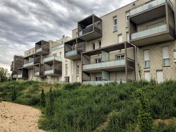 Low angle view of residential buildings against sky