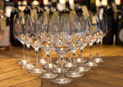 Close-up of wine glasses on table