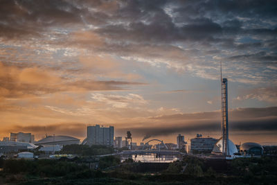 Dramatic sunrise sky over urban landscape of glagow scotland