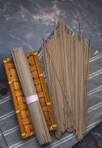 High angle view of raw soba noodles on marble