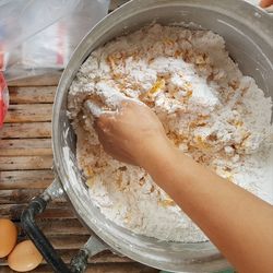 High angle view of person preparing food