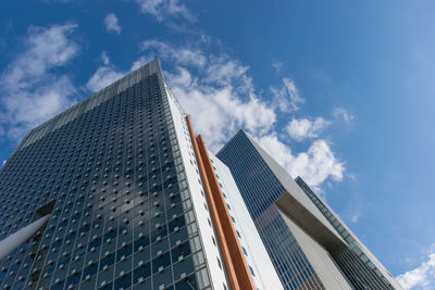 Low angle view of modern buildings against sky