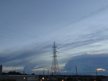 Electricity pylon against sky