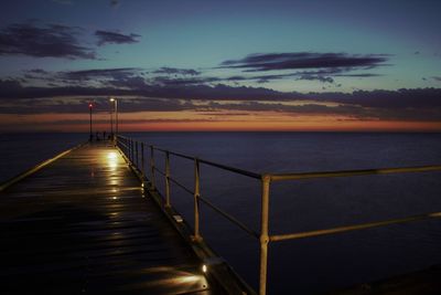 Scenic view of sea against sky at sunset