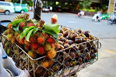 Close-up of fruits on street