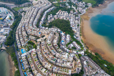 High angle view of road amidst buildings in city