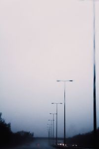 Snow covered landscape against sky
