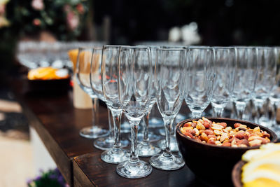 Luxury table settings for fine dining with and glassware, pouring wine to glass.beautiful background