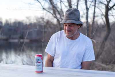 Portrait of man drinking bottle