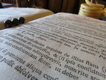 Close-up of text written on book