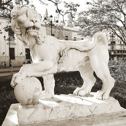 Statue against clear sky in park