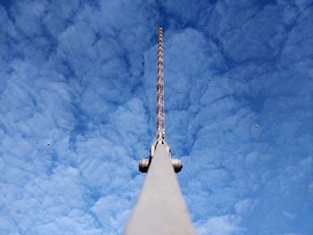 Low angle view of tower against cloudy sky