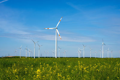 Modern wind power plants on a sunny day seen in germany