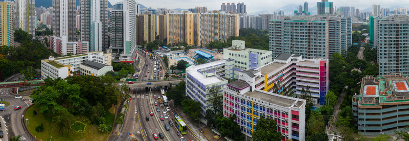 High angle view of street amidst buildings in city