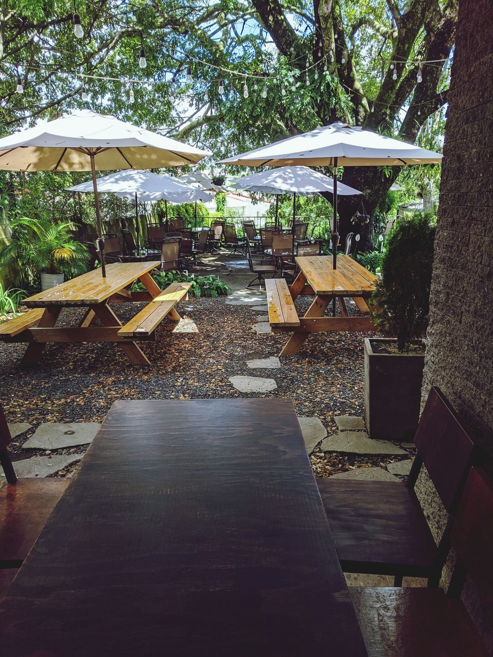 CHAIRS AND TABLES IN SWIMMING POOL