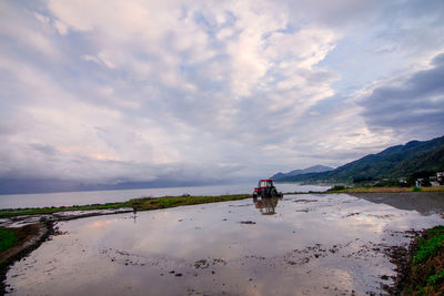 Scenic view of beach against sky