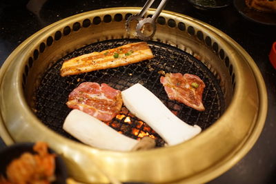 High angle view of meat in cooking pan