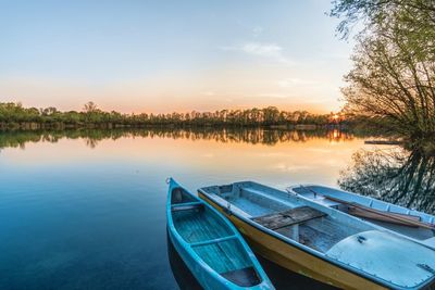 Scenic view of lake against sky during sunset