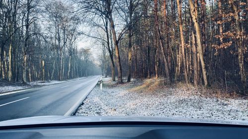 Country road seen through car windshield
