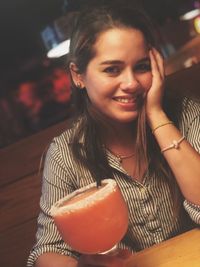 Portrait of a smiling young woman