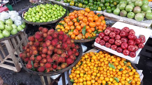 High angle view of fruits for sale at market stall