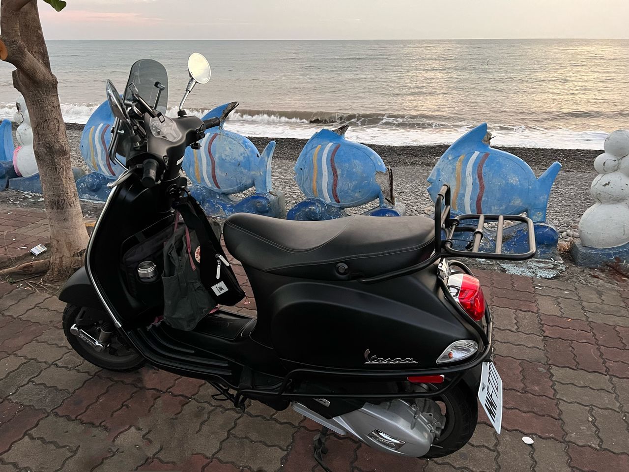 sea, water, transportation, mode of transportation, vehicle, travel, beach, nature, sky, motorcycle, land vehicle, land, horizon over water, scooter, day, travel destinations, vacation, trip, outdoors, horizon, holiday, car, motorcycling, sports, no people, scenics - nature